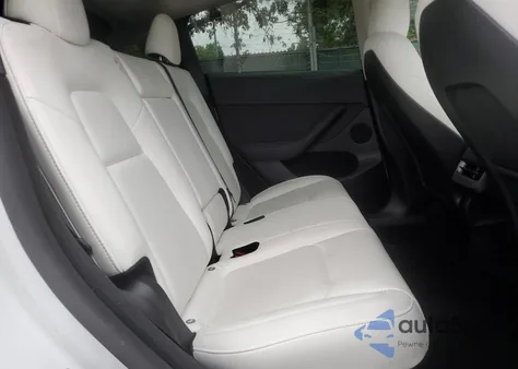 2024 Tesla Model Y from USA, damaged, VIN 7SAYGDED4RF153032